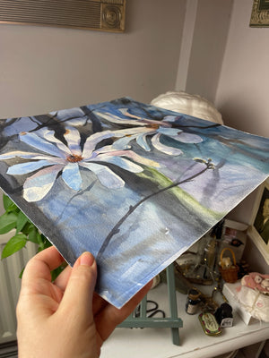 Angled view of Magnolia in Soft Light showing the watercolour paper and painted surface.